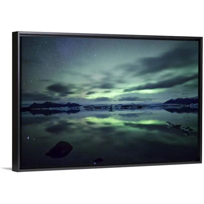 "Aurora borealis over Jokulsarlon glacial lagoon in south Iceland." Black Float Frame Canvas Art