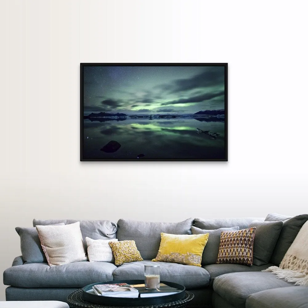 "Aurora borealis over Jokulsarlon glacial lagoon in south Iceland." Black Float Frame Canvas Art